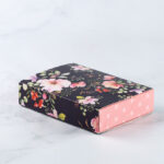 Dark Floral Sleeve with Pink Box